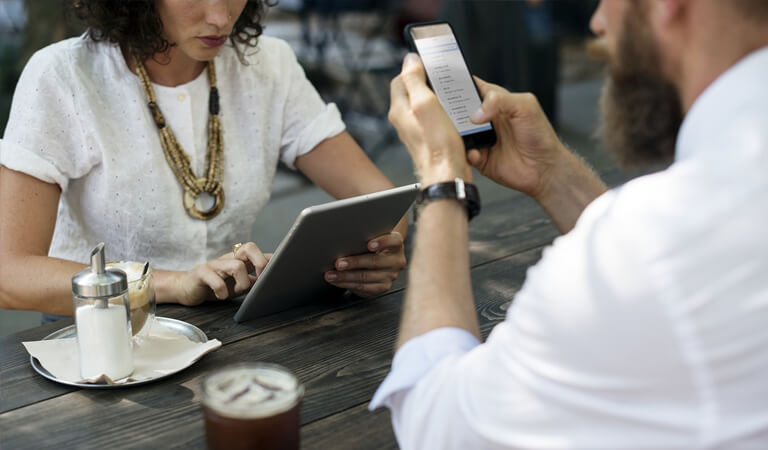 Team members working at a table